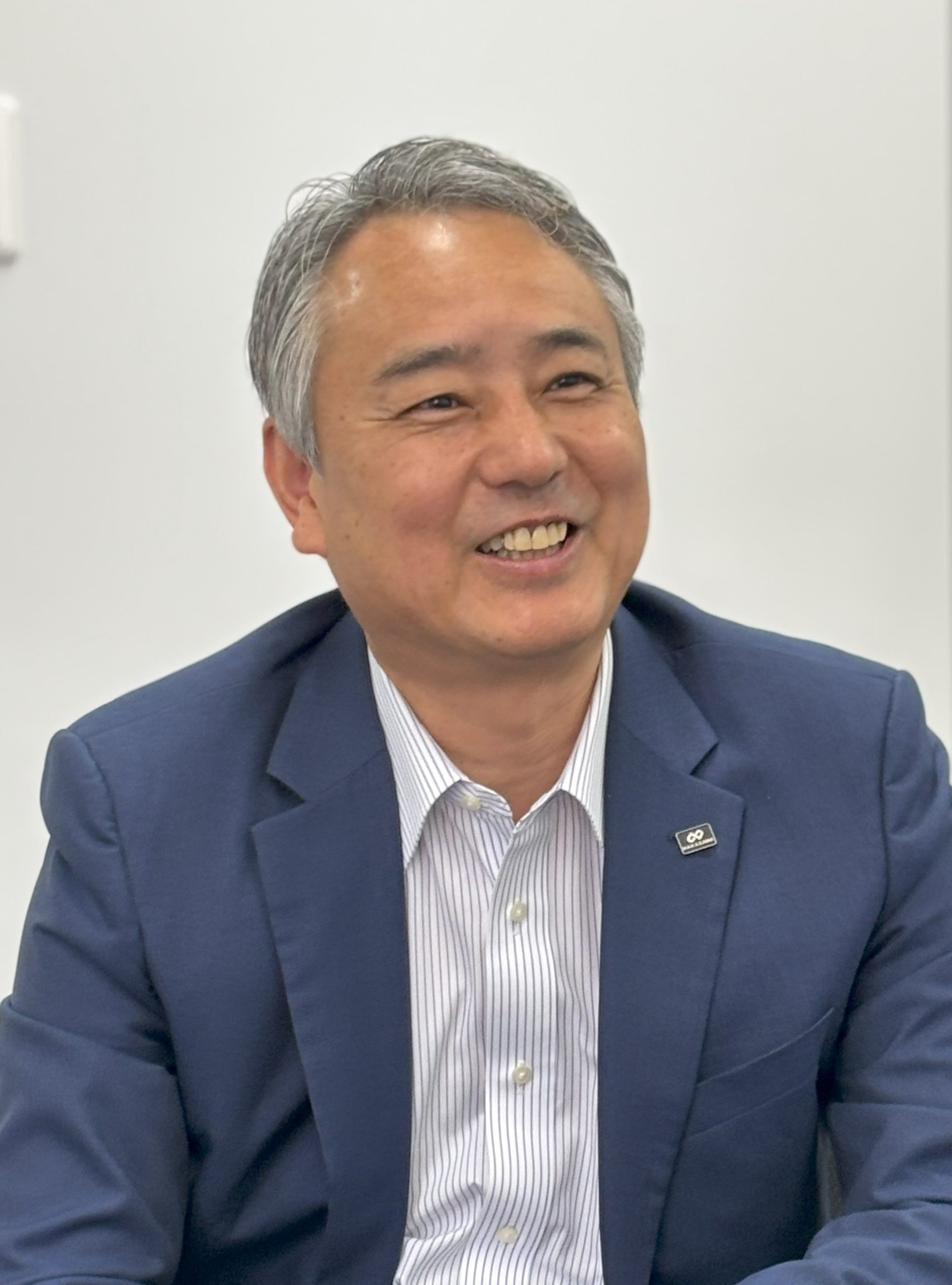 インタビューに応じるナカザワ株式会社・田村雅彦社長